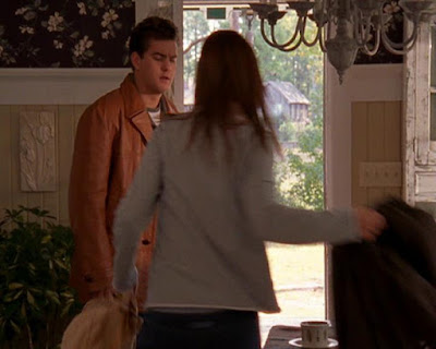 Pacey watching as Joey grabs her luggage to rush out the door