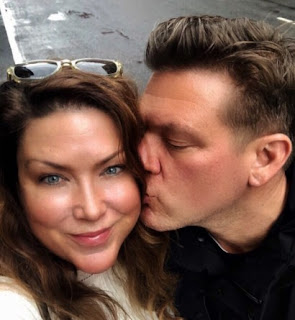 Tolan Clark clicking a selfie while her husband Tyler Florence kissing