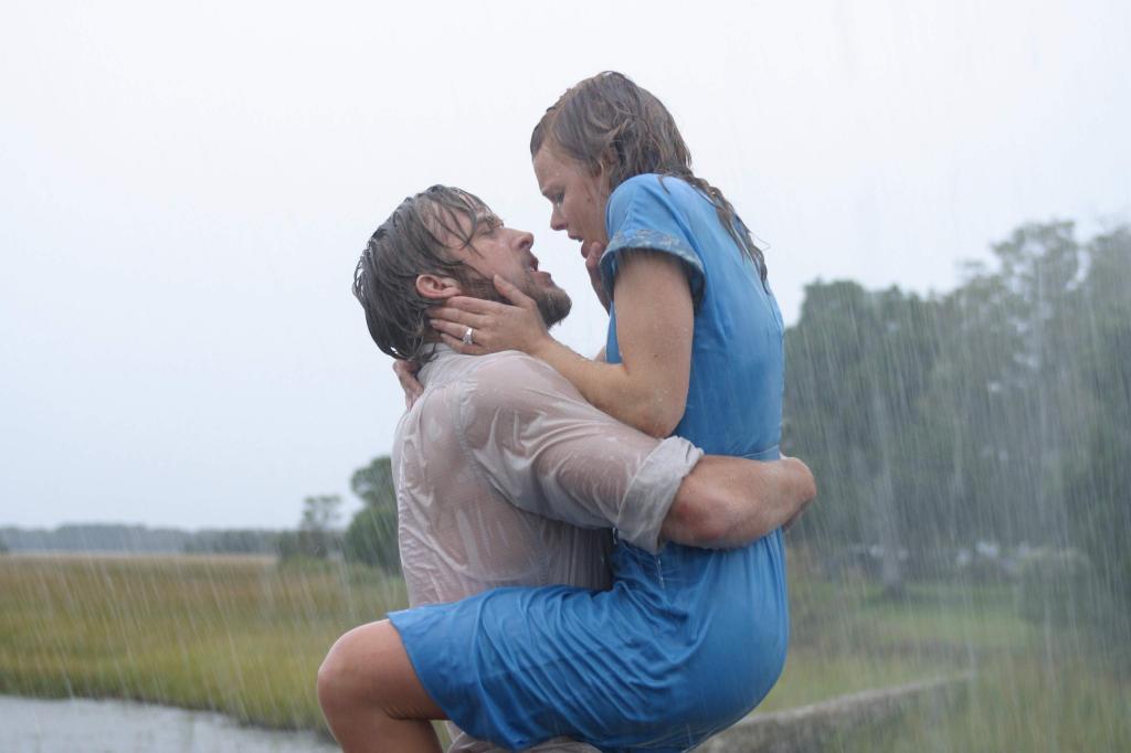 couple kissing in rain. romantic couple kissing