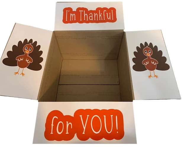 box with thanksgiving stickers on inside