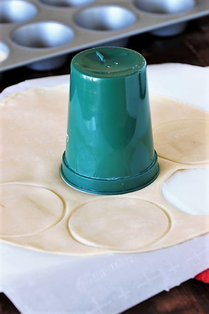 filled cupcakes amongst a pie crust bottom in addition to 1 Grandma's Echo Cakes