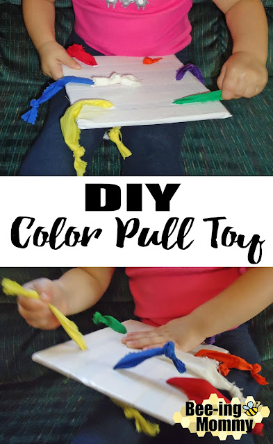 DIY toy, homemade toy, learn colors toy, gross motor skills, color toy, easy toy, pull toy, color pull toy, motor skills toy, homemade toys, DIY toy, homemade pull toy, cheap toy, DIY cheap toy, repurposed toy, repurposed craft, repurposed game, toddler toy, DIY toddler toy, DIY game, toddler game, color game, color activity, preschool color toy, homemade color toy, cheap color toy, free color toy, children activity, teaching, teaching colors, learning color toy, learning colors, ribbon toy, fabric craft, fabric toy