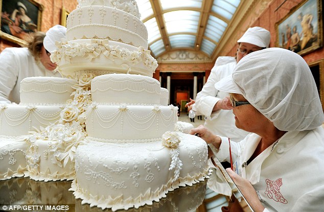 The eighttiered Royal Wedding cake decorated with 900 symbolic sugarpaste 