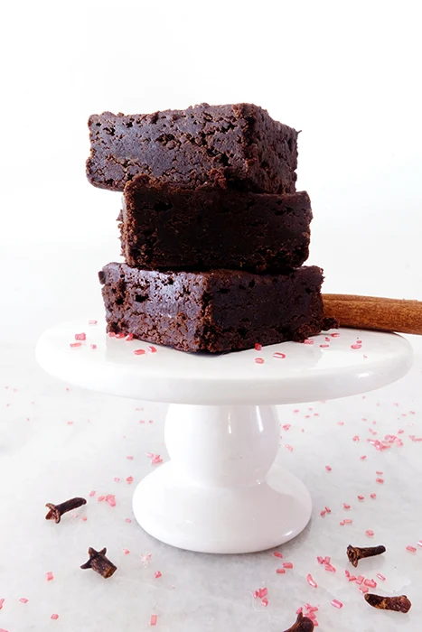 Gingerbread Brownies stacked on a stand