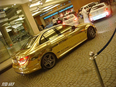 Amazing but Wasteful Gold Cated Car Mercedes c63 AMG