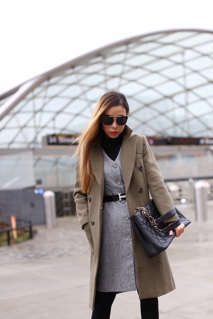 Olive coat, grey belted dress, work attire, casadei ankle booties, prada sunglasses, chanel grand shopping tote, nyc street style, how to dress from work to play, hermes belt