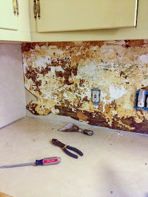kitchen renovation - wallpaper removal - light fixture replacement