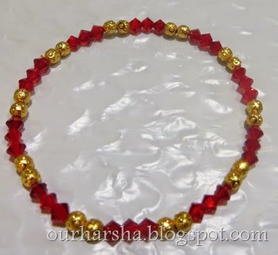 Red beaded bracelet (2)