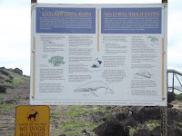 Kaena Point Coastal Reserve sign at the fenced and gated entrance on the north side trail. Oahu, Hawaii.