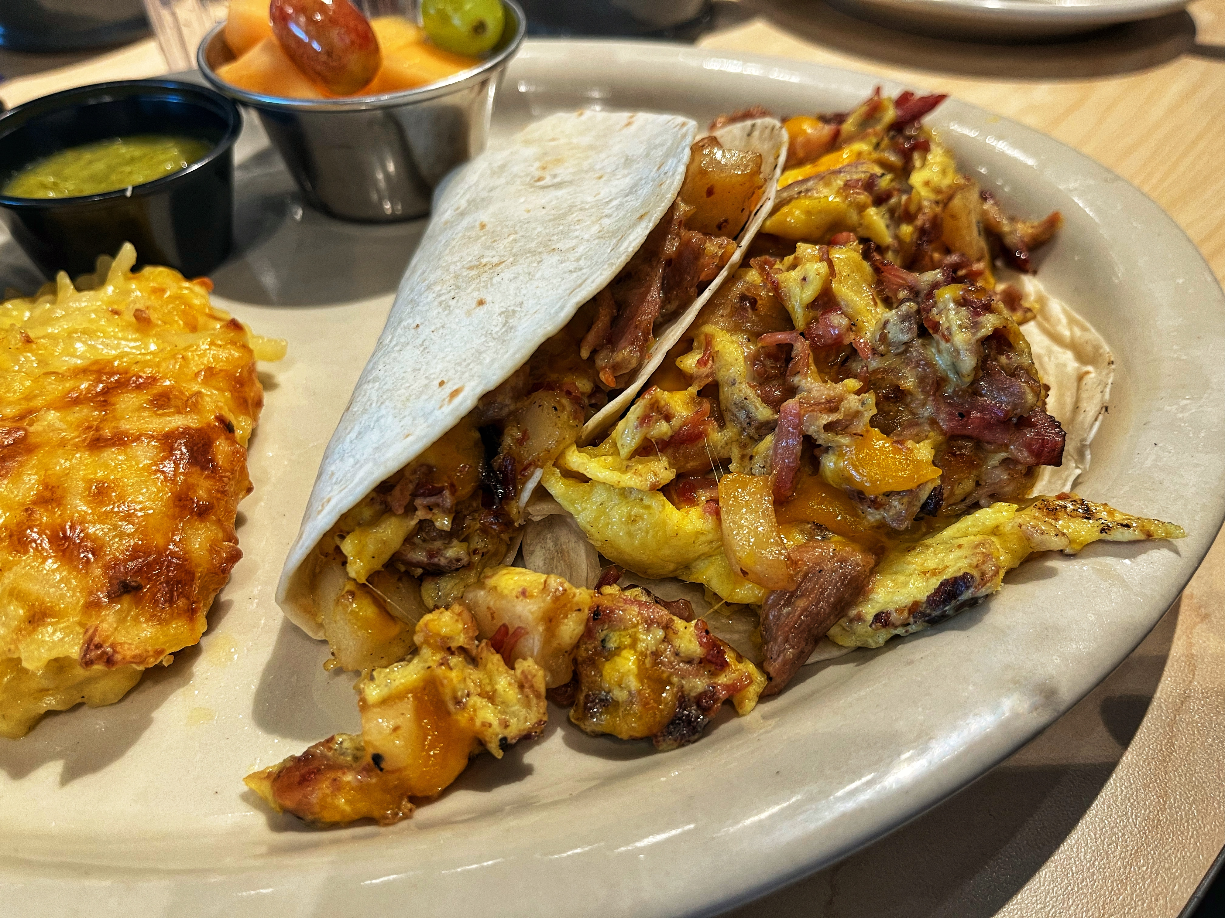 "cowboy" breakfast tacos with hashbrown casserole and coffee; Toasted Yolk; Waco; Texas; USA
