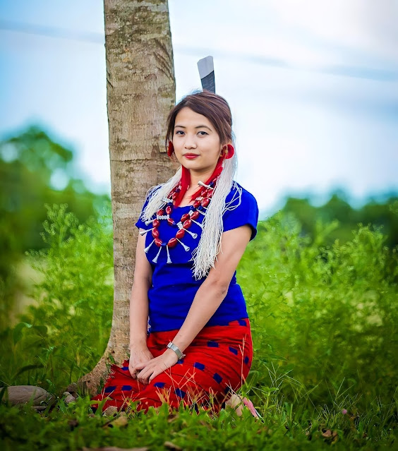 An Ao young lady wearing traditional dresses and attires