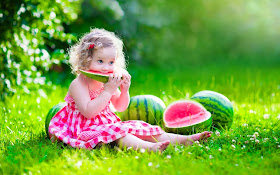 eating-watermelon-small-baby-in-pink-flower