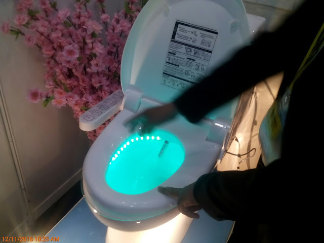 Water closet with LED light and electronic bidet with one push of a button.