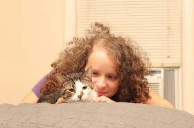 Photo of Beth Spencer with her cat, Sean.