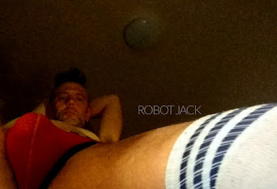 Robot Jack wearing Pump! jockstrap and thigh-high socks shows his cock bulge