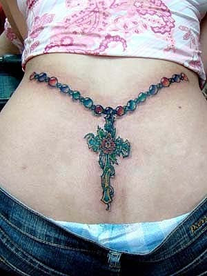cross tattoos for women on back. tattoos for women on ack.