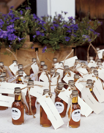 This rustic themed wedding did maple syrup and place cards as one