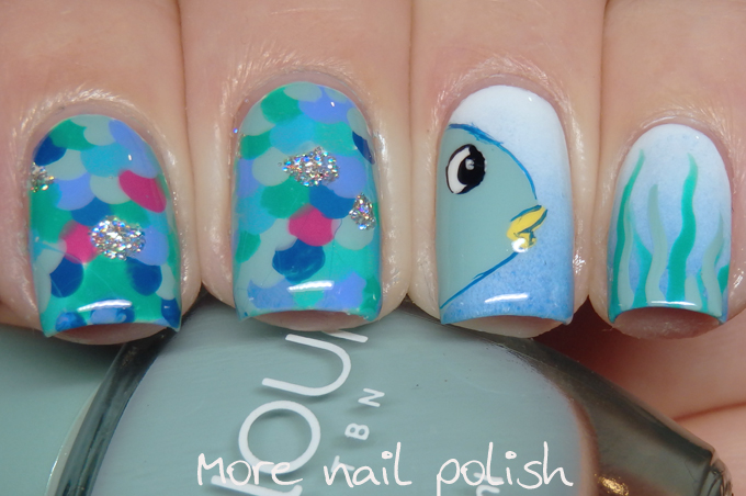 Mermaid nails with a fish nail art design. 🐠 : r/Nails
