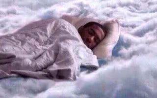 MAN SLEEPING ON CLOUDS