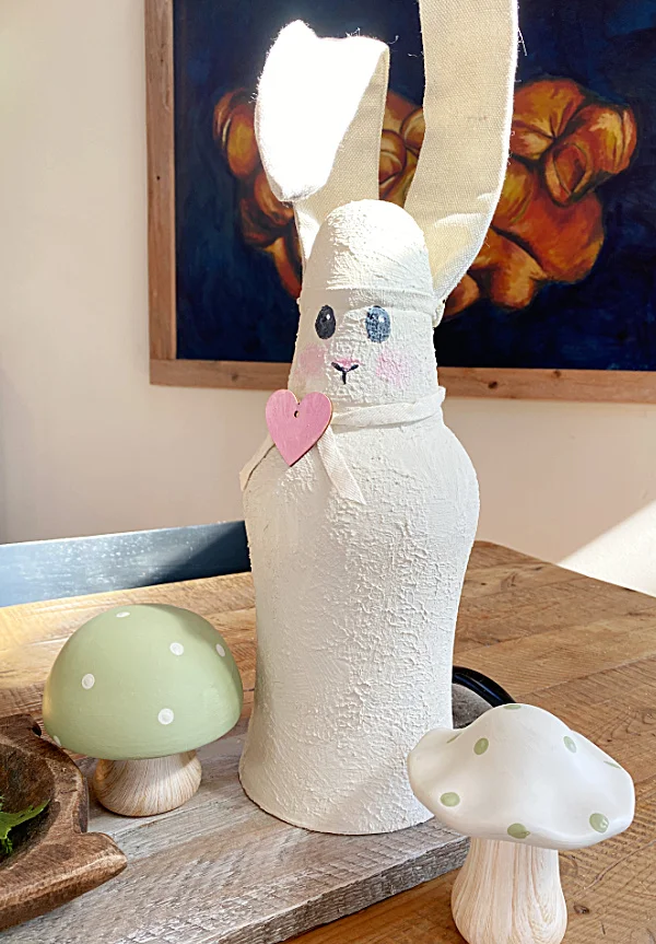 Repurposed Easter bunny on table with mushrooms