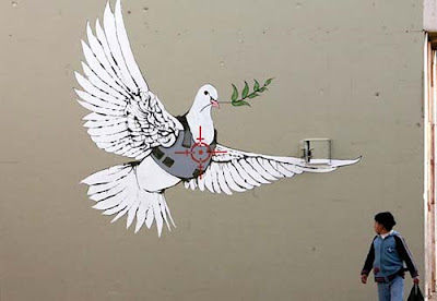 Bansky graffiti bird in Bethlehem