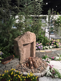 Can't say I've ever seen one of these before!  Garden Fireplace | Boston Flower & Garden Show 2017