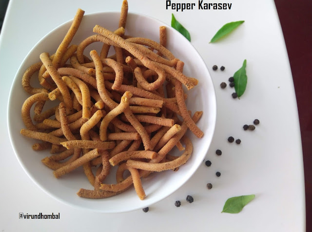 Pepper Karasev| Milagu Karasev - Pepper Karasev - prepared with besan flour,  rice flour and spiced up with chilly powder and freshly ground black pepper powder. Great evening snack during winter days. If you are looking for an easy snack to prepare within an hour, try this pepper karasev. It comes together easily without much work. Karasev is typically made by scrapping the dough in a ladoo ladle. It's difficult for me to scrape directly into the hot oil, so I prefer to use the murukku press. But if you like the traditional method, you can prepare as you wish. or the flour, try to use freshly prepared homemade besan flour and rice flour. If you don't have much time, use good quality besan flour and rice flour. Please do not use store bought black pepper powder for this karasev, because your karasev won't taste good. In store bought black pepper powder they will powder, it finely and you cannot enjoy the taste of the black peppers in the sev. Moreover the sev tastes flavourful in the homemade coarsely powdered black pepper.