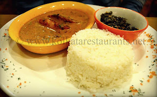 Spicy Grilled Bhetki with Radhuni-Enriched Curry bengali continental mix at Kolkata Restaurants