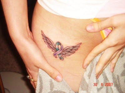 bow tattoos,wings tattoos