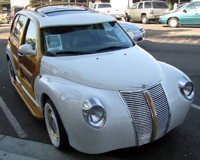 2 of 10 woody custom PT Cruisers made in Riverside