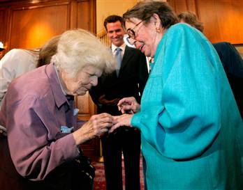 Del Martin placing ring on finger of Phyllis Lyon, 16 June 2008, San Francisco City Hall -- Photo by Marcio Jose Sanchez, AP