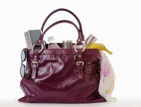glamorous handbag with Mum things in 
