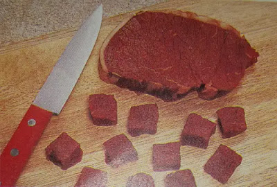 " drawing of meat of different sizes with knife"