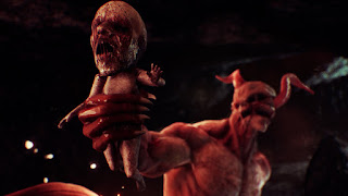 Agony - demon holding screaming baby in one hand