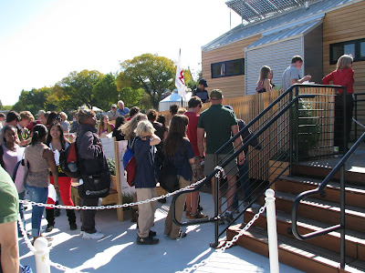 Visitors line up to see the BeauSoleil Solar Home