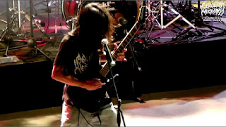 Death metal band live show performance, Musician playing the guitar in live