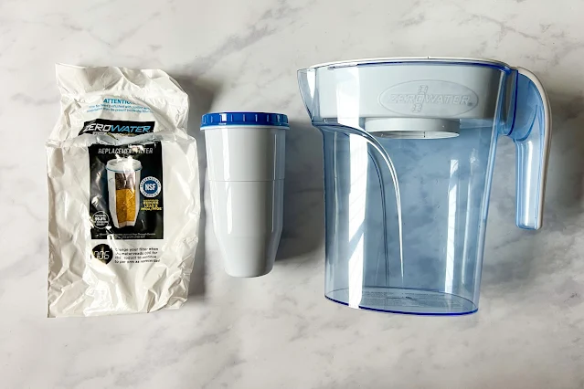 ZeroWater jug next to the large filter and packaging