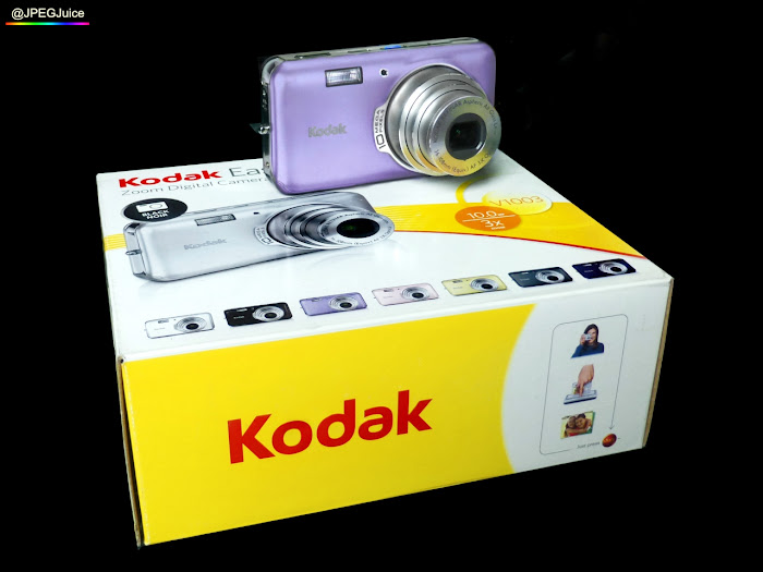 Kodak V1003 digital camera with its original box