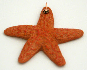 Polymer clay focal (Tina's signature, a star fish!) by Tina Holden @ Beadcomber Originals :: All Pretty Things