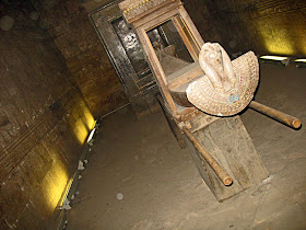 mummy guarded by god horus in edfu temple sanctuary