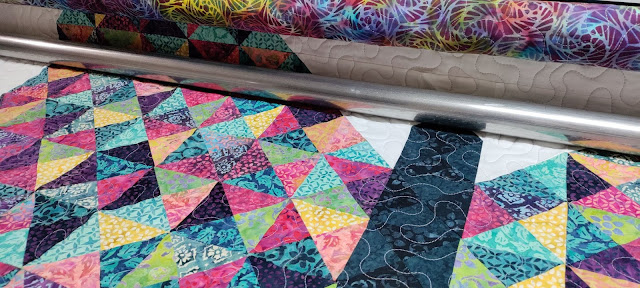 Meander quilting on a longarm