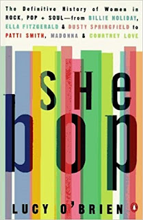 Front cover of the original She Bop, with vertical coloured stripes behind the large title.