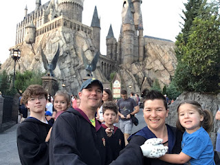 The McAndrews family in front of Hogwarts castle.