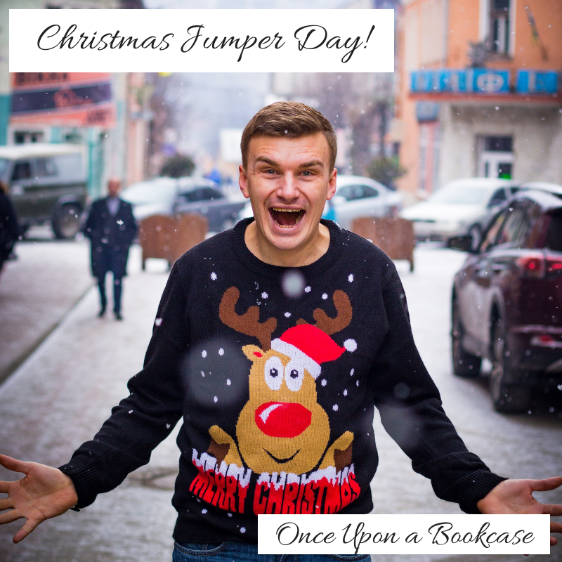 A photo of a man in a navy blue jumper featuring an image of Rudolph saying Merry Christmas, holding his hands out to the side. The photo is edited to show the blog post title and blog title.