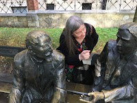 A warmup exercise with mathematician statues in Krakow, October 2023