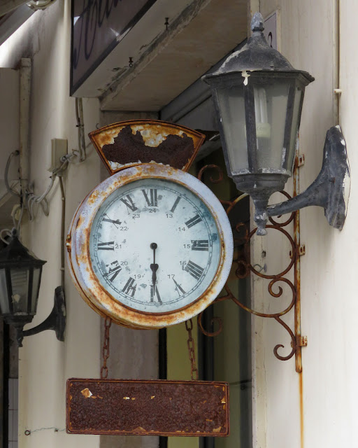 A weathered clock, Via Malta, Livorno