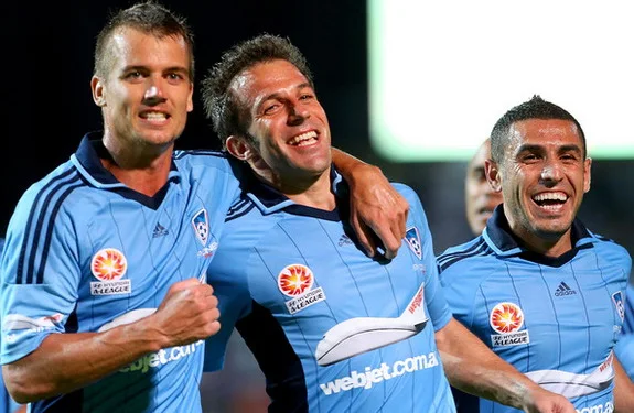 Alessandro Del Piero celebrates with Sydney FC teammates after scoring against Perth Glory