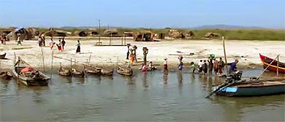 Arriving in Mrauk U people on the river crossing