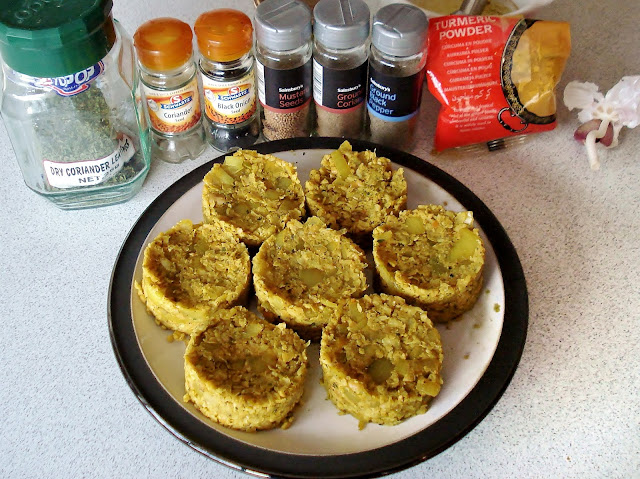 Uncooked Falafel Burgers with herbs and spices