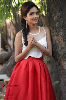 Actress Mahima Nambiar Latest Stills in White Top and Red Skirt at Kuttram 23 Movie Press Meet  0015.jpg